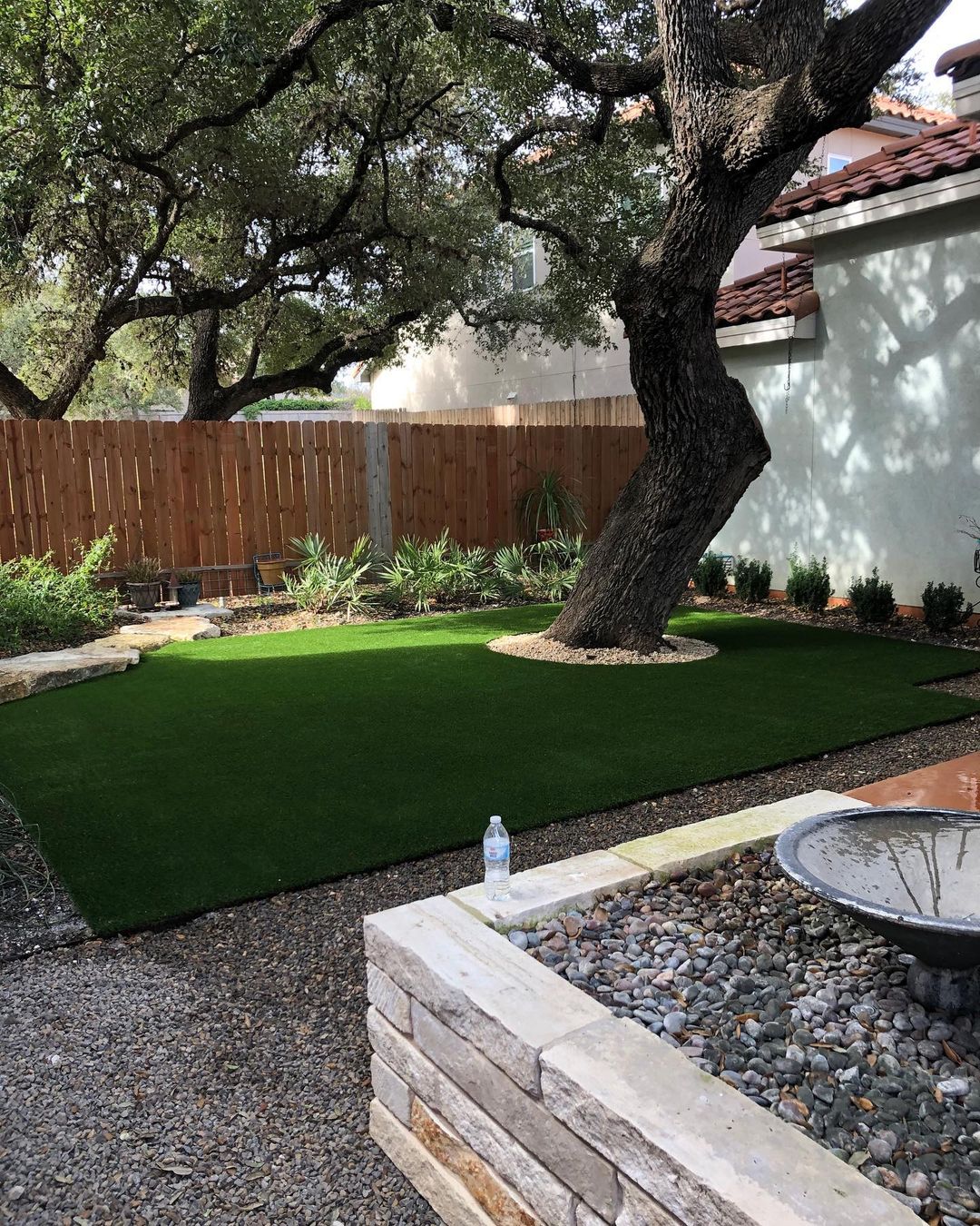 synthetic grass under the shade of a tree
